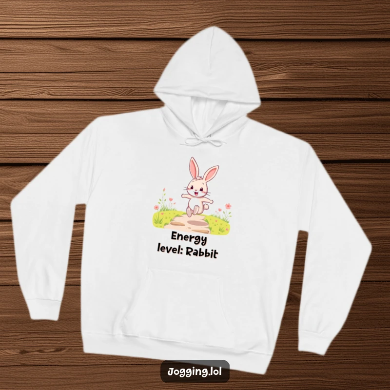 Funny Hoodie with a happy cartoon rabbit character energetically bounding along a path, radiating pure happiness and warmth.
