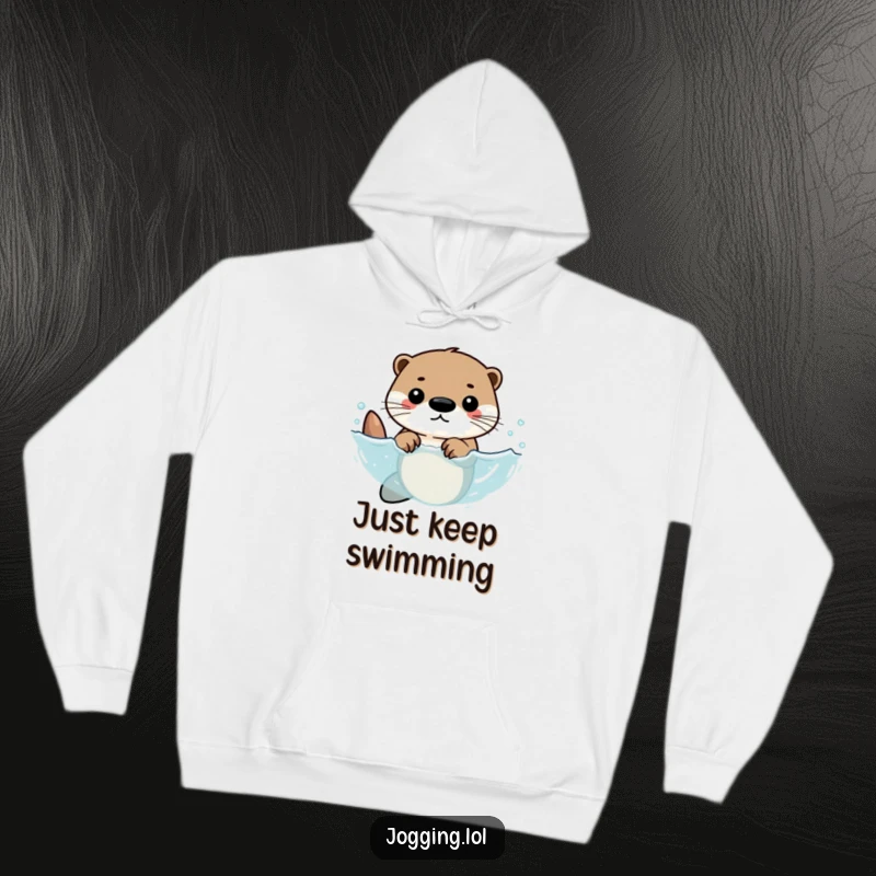Funny hoodie featuring a determined otter character swimming with rhythmic strokes, conveying a sense of focus and aquatic athleticism.